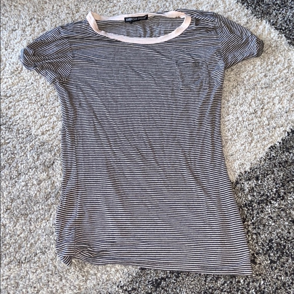 black and white striped shirt with pink outline